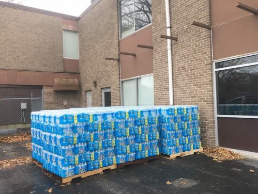Cases of water waiting to be delivered to the residents of Benton Harbor. 