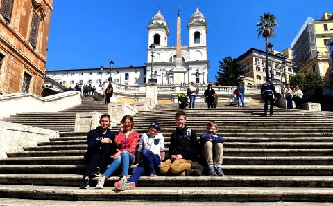 Winkler (second from right) sits with his friends in Rome. 